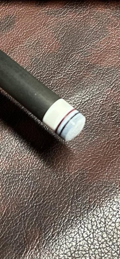 A freshly installed cue tip, close up